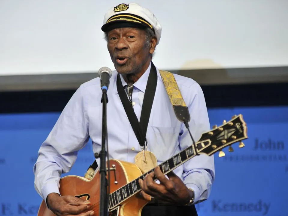 In this Feb. 26, 2012 file photo, rock 'n' roll legend Chuck Berry performs "Johnny B. Goode" at the John F. Kennedy Presidential Library and Museum in Boston.