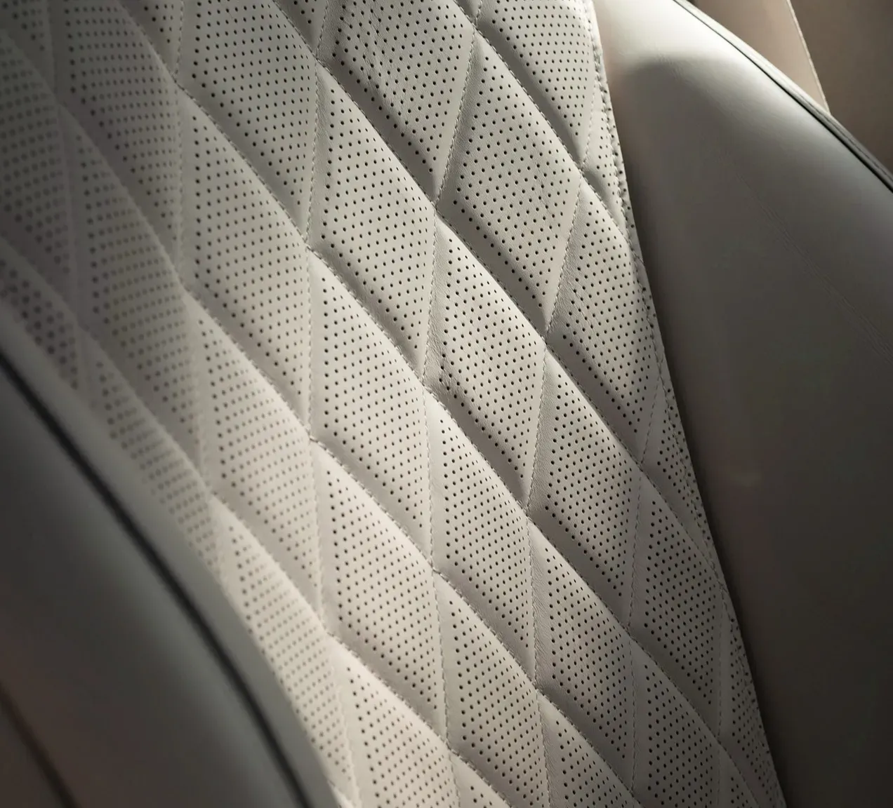 Indulgent seating comforts inside the Mercedes-Benz S-Class Sedan, featuring massage functions