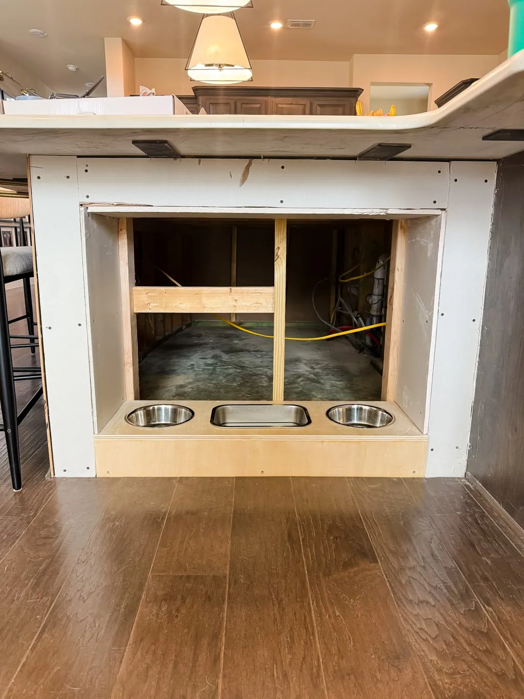 Installing drywall over internal frame supports