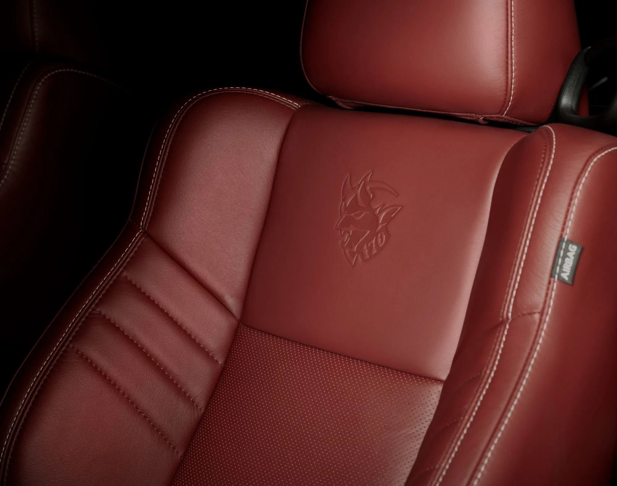 Interior of Dodge Challenger SRT Demon 170 with lightweight houndstooth seats and Demon branding