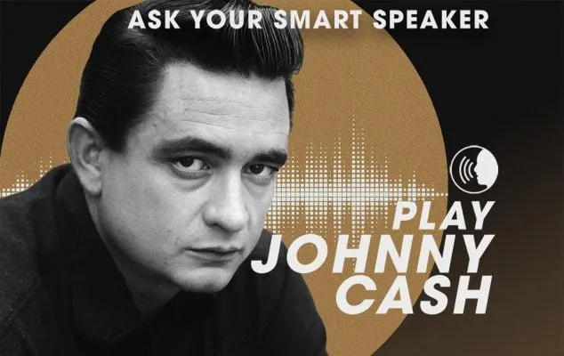 Johnny Cash on stage, singing passionately into a microphone
