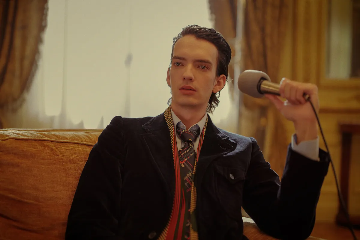 Kodi Smit-McPhee portraying Mandrax in a pensive moment during 'Maria'