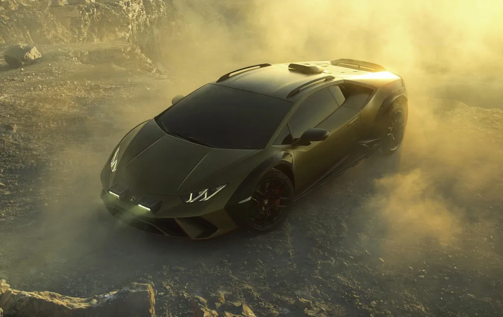 Lamborghini Huracán Sterrato in action on a loose surface, demonstrating its rally-inspired capabilities.
