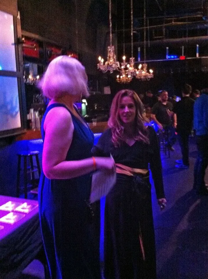 Lisa Marie Presley signing autographs in 2012