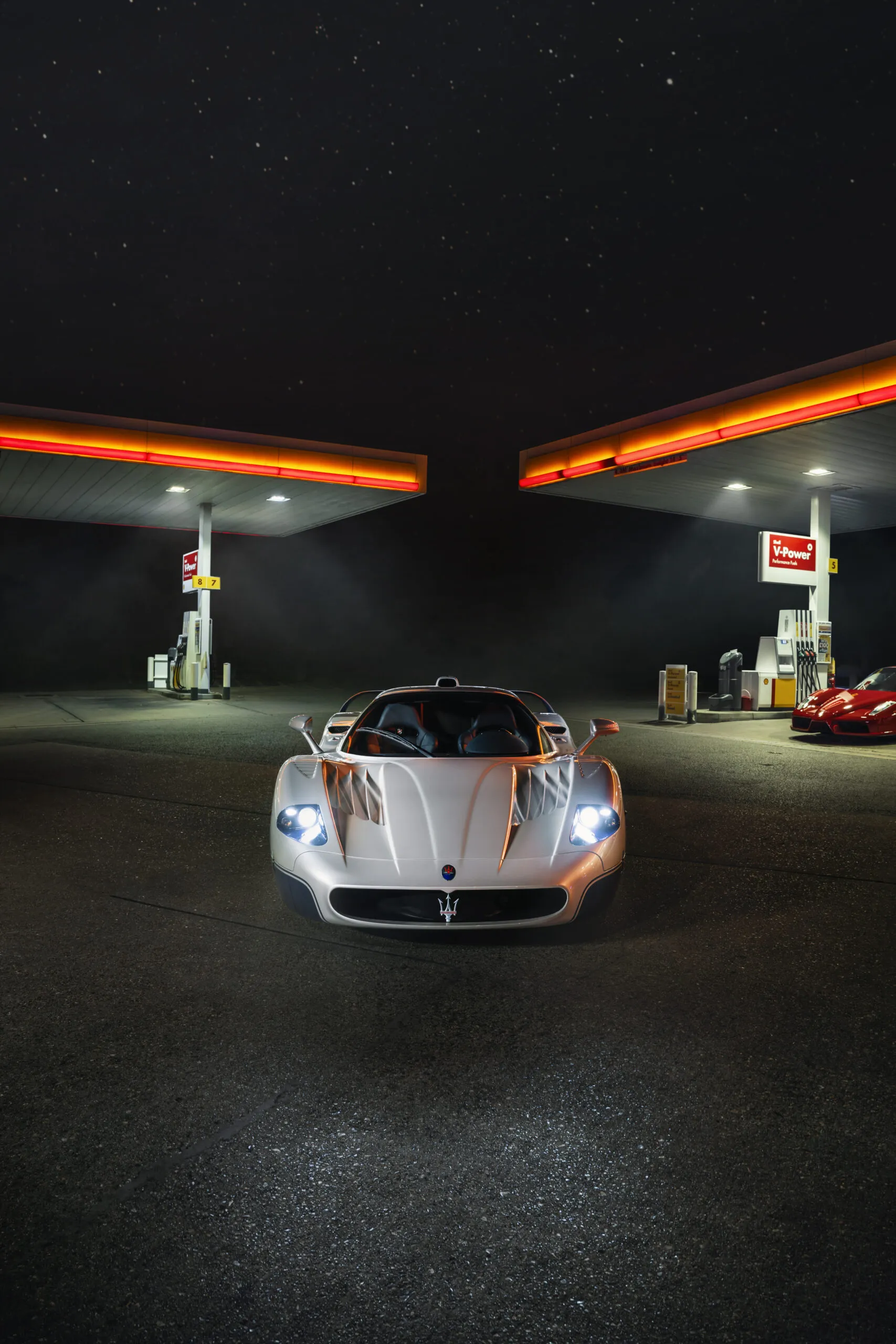 Maserati MC12 and Ferrari Enzo side-by-side on display