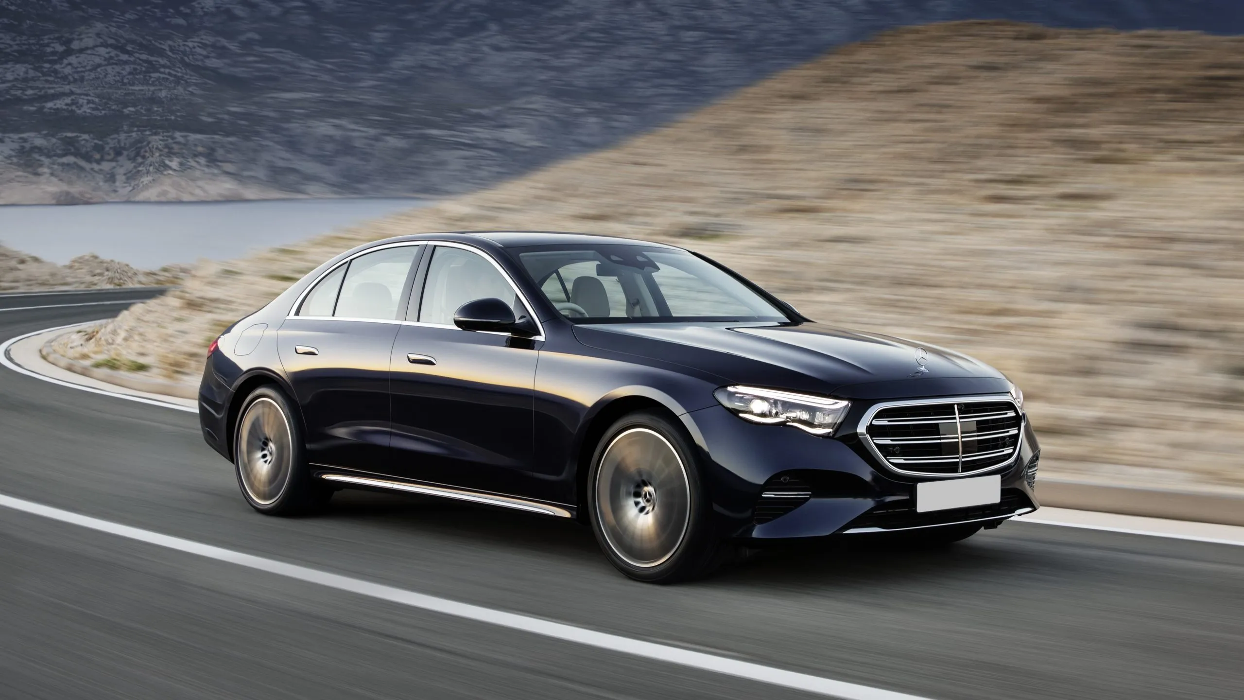 Mercedes-Benz E-Class with its distinctive elongated profile, emphasizing rear passenger space