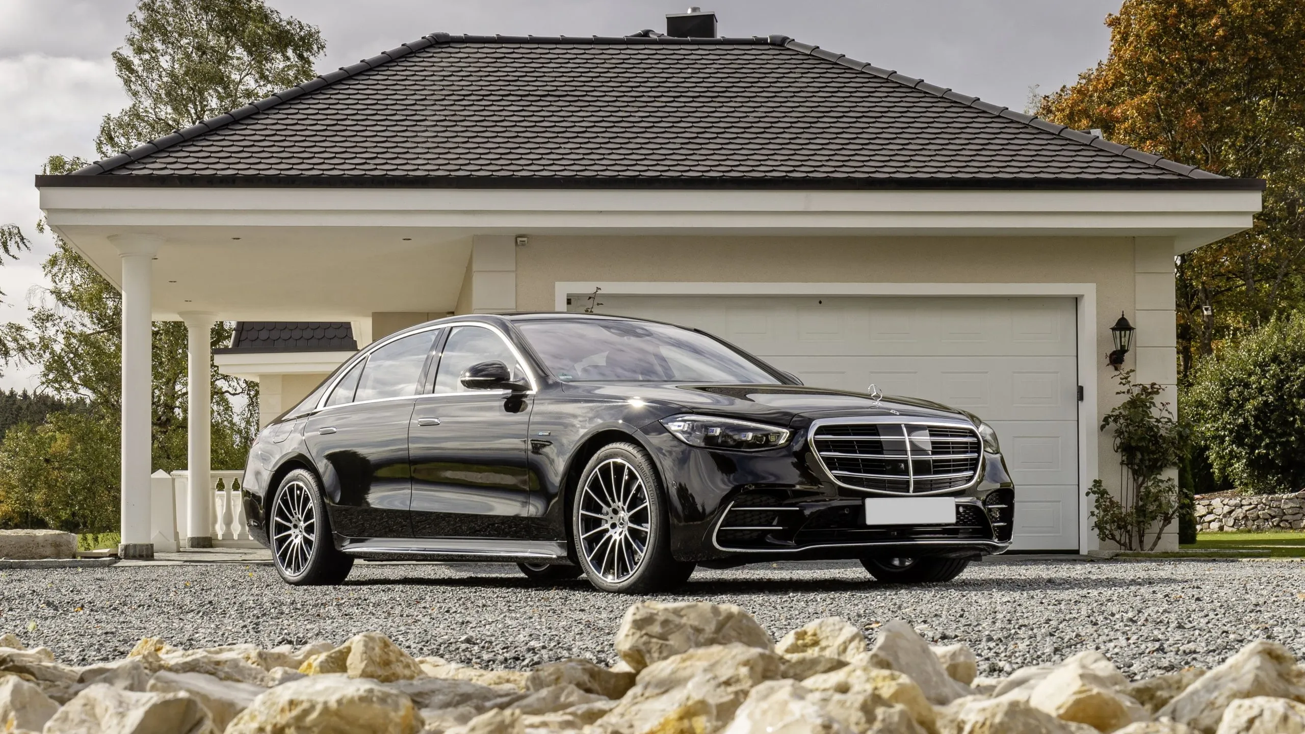 Mercedes-Benz S-Class in a dynamic shot, highlighting its sleek and prestigious profile