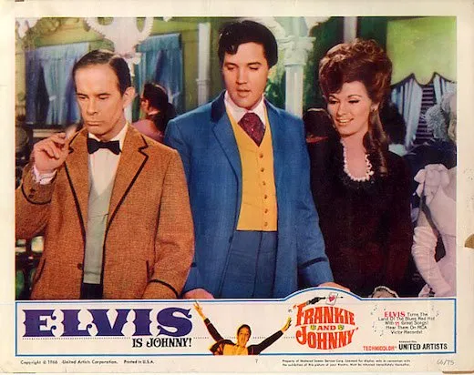 Nancy Kovak as Nellie Bly in a scene from the film Frankie and Johnny, wearing a period costume