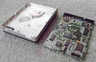 Opened hard disk drive showing platters and read/write heads