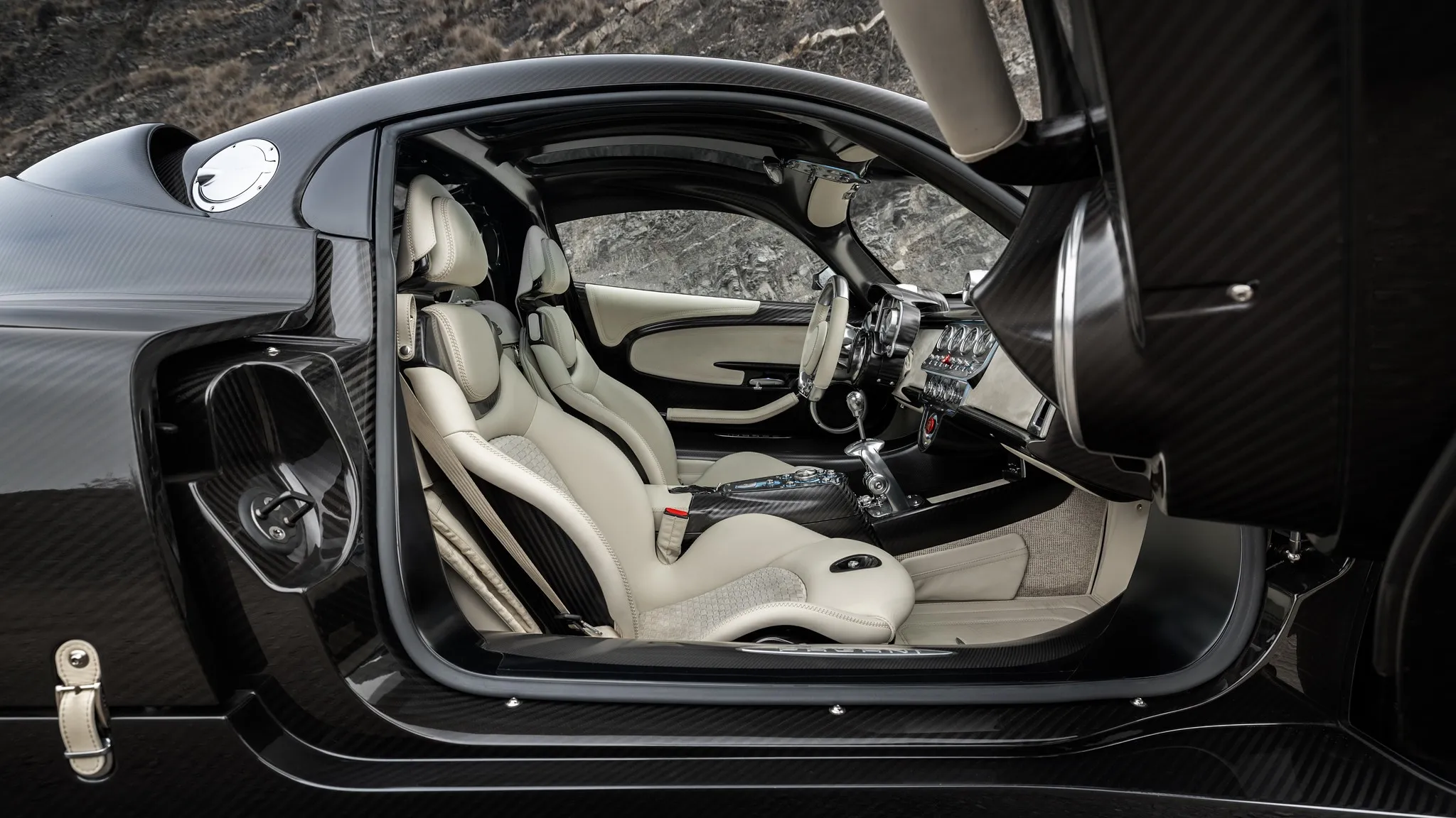 Pagani Utopia driving on a winding road