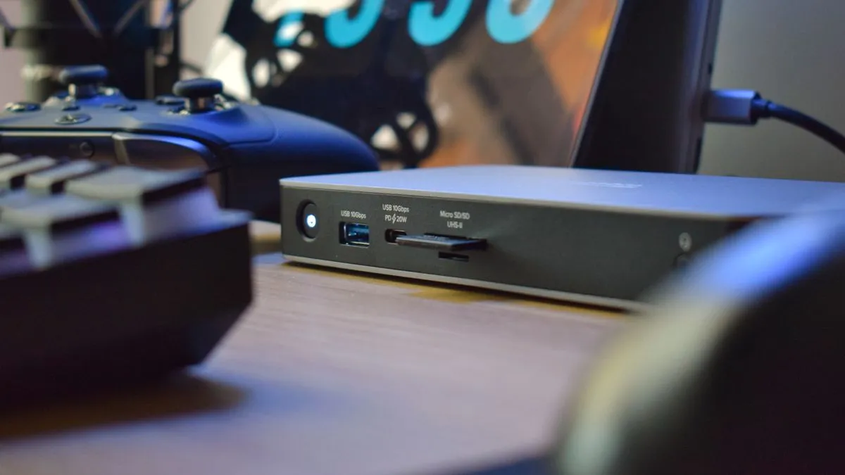 Plugable Dual HDMI Docking Station (UD-4VPD) on a desk, highlighting its compact design.