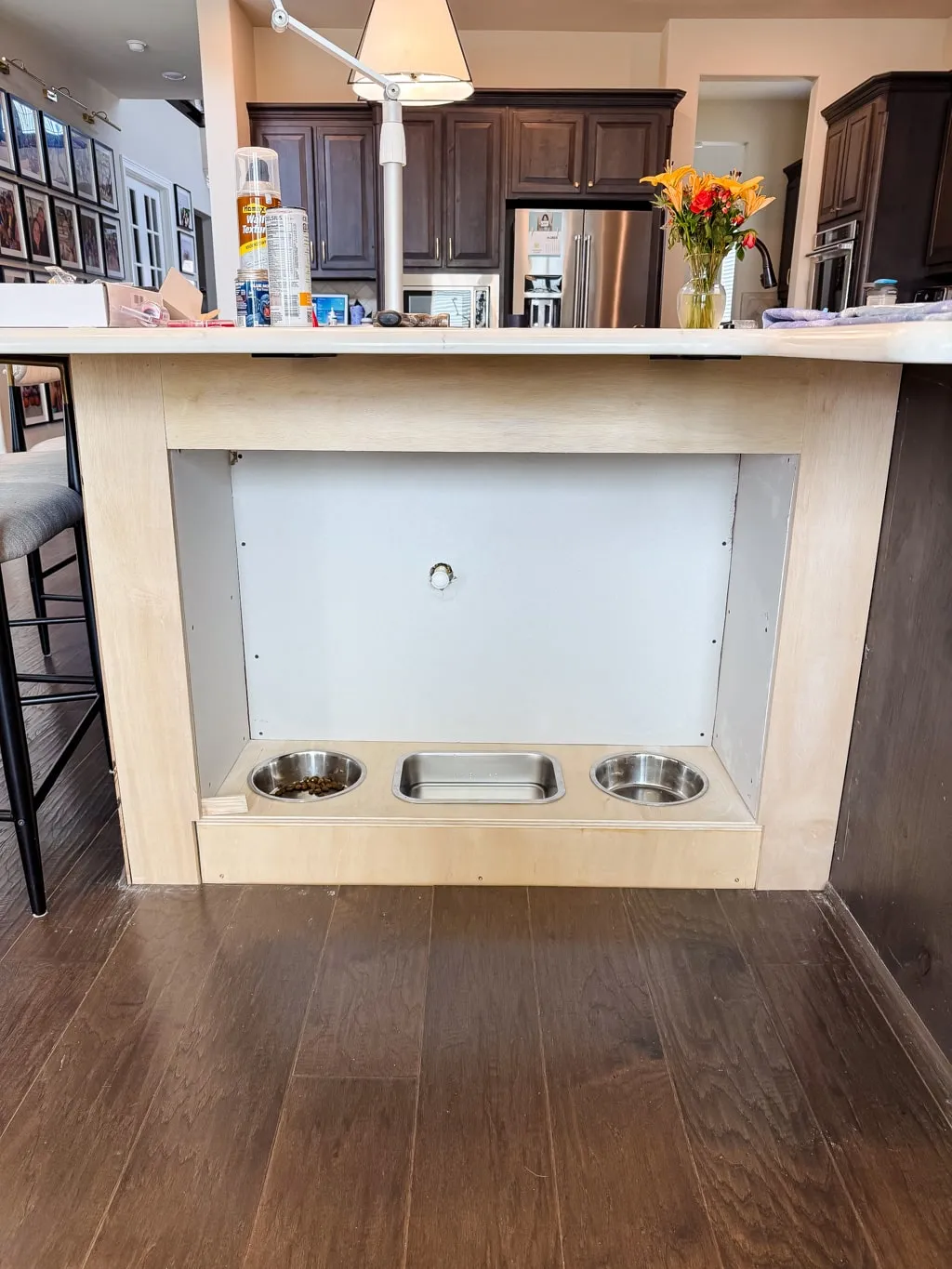 Plywood face frame attached to feeding station