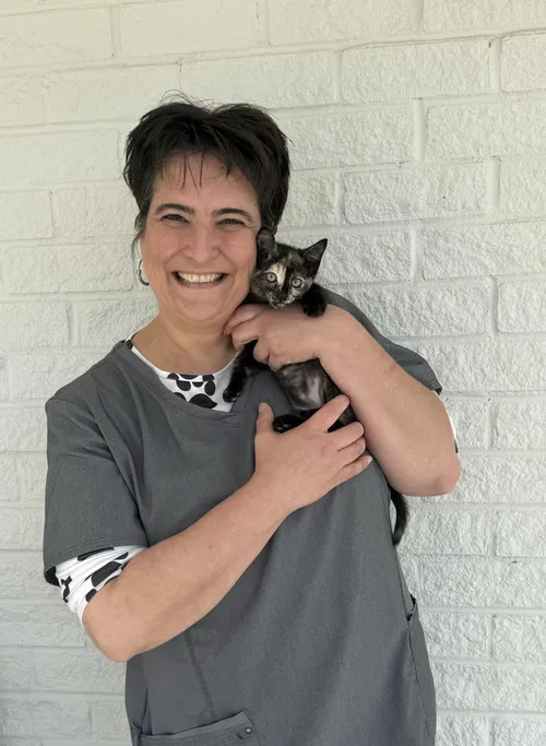 Portrait of Jessica Coates, DVM, veterinarian specializing in preventive health