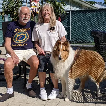 Rainier with his new Mitas family, looking happy and settled