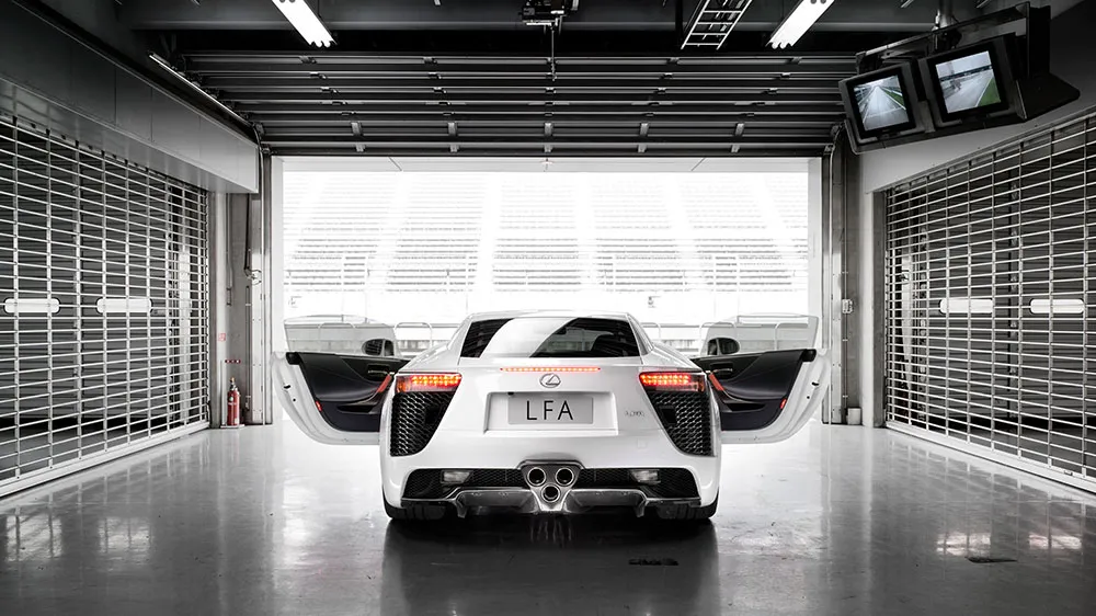 Rear three-quarter view of the Lexus LFA with its iconic doors open
