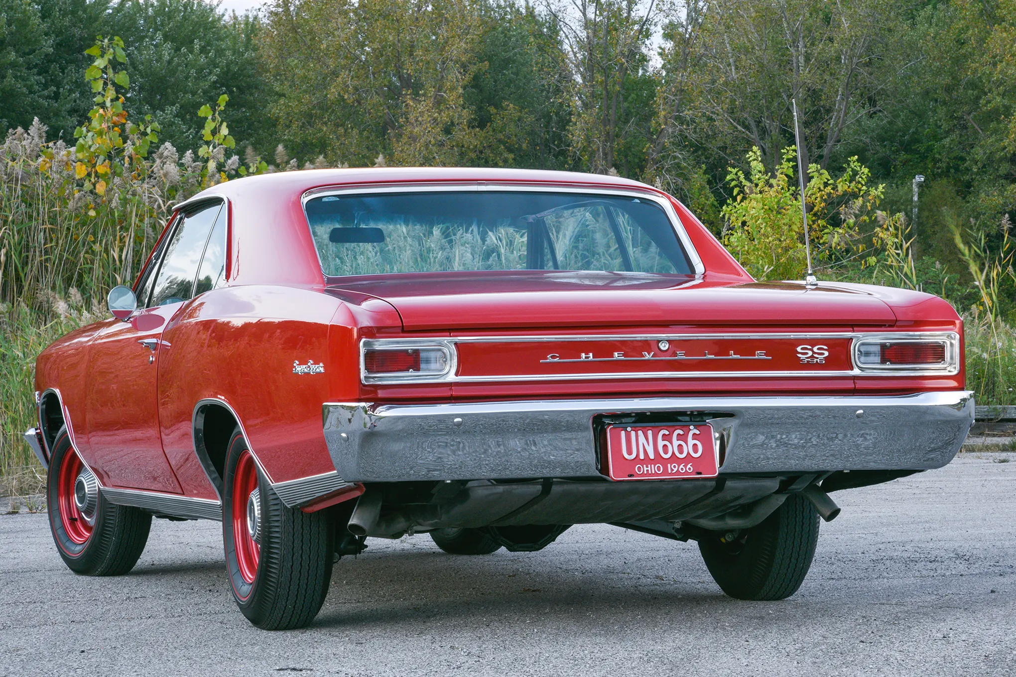 Rear three-quarter view of the restored 1966 Chevrolet Chevelle SS396 "Bounty Hunter" in Regal Red