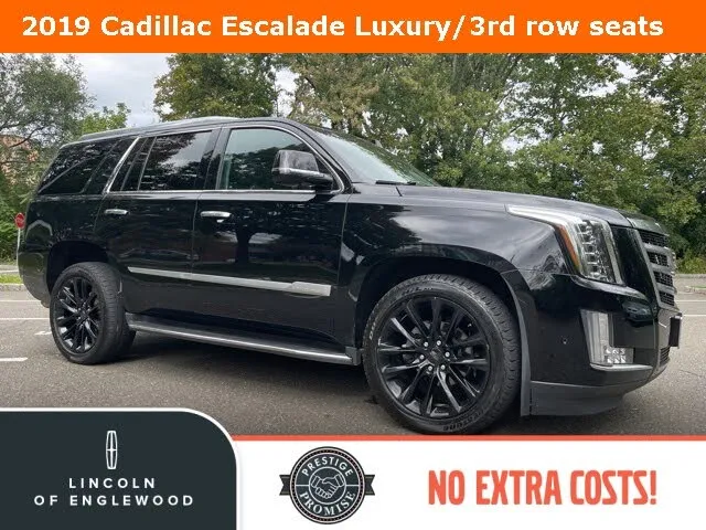 Rear view of a Black Cadillac Escalade