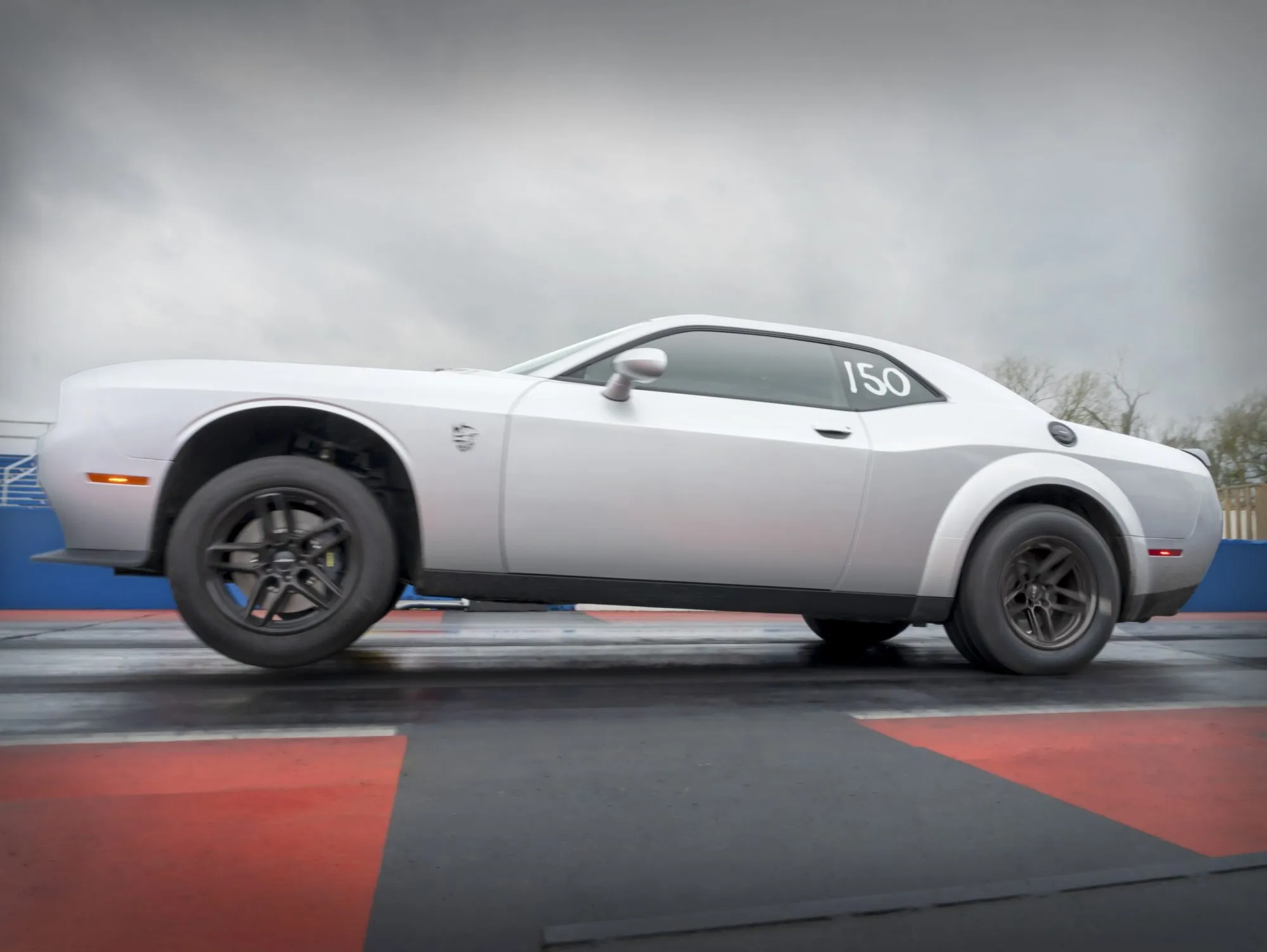 Rear view of Dodge Challenger SRT Demon 170 emphasizing lightweight wheels and diffuser