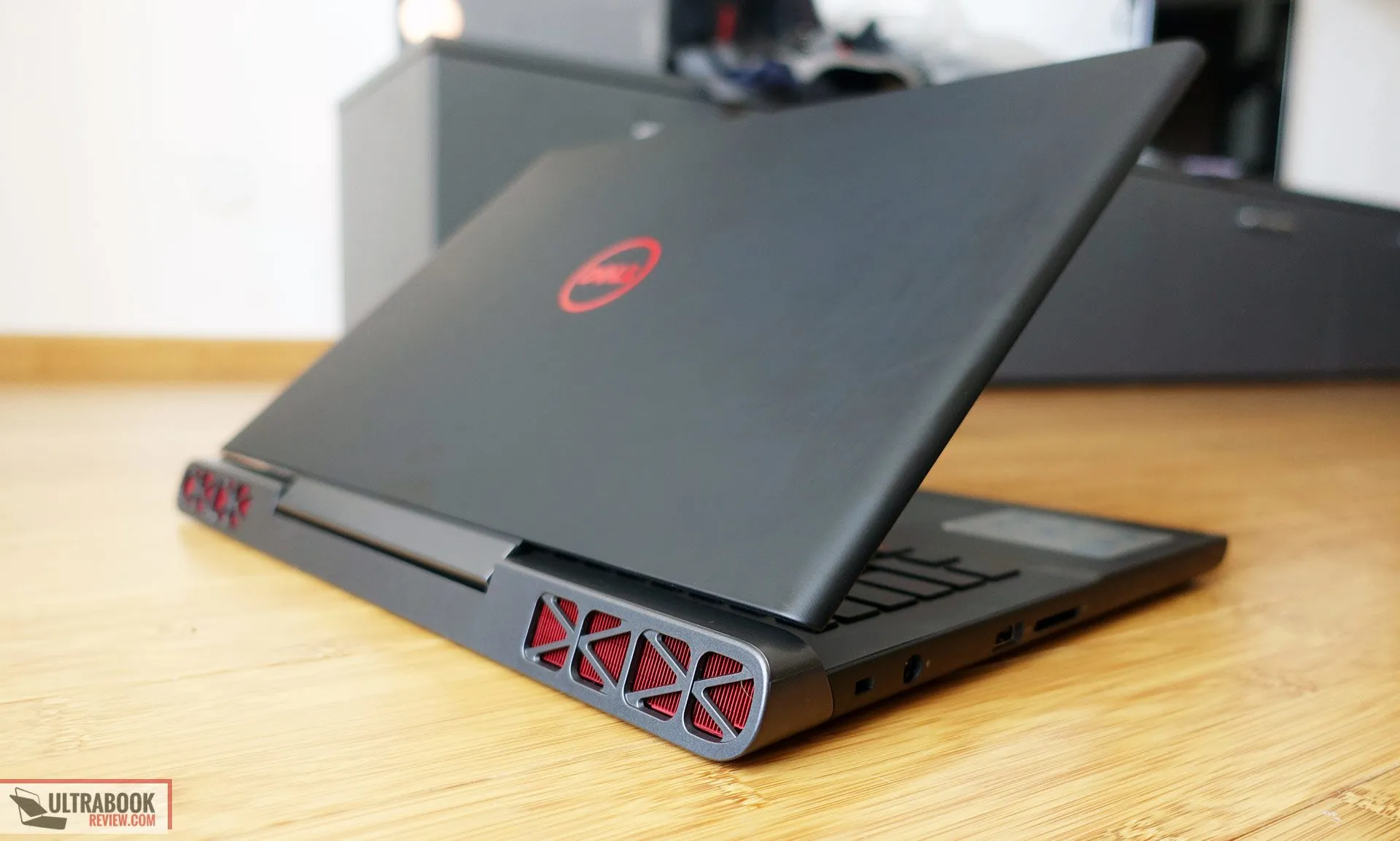 Red and silver design accents on the Dell Inspiron Gaming laptop's back edge