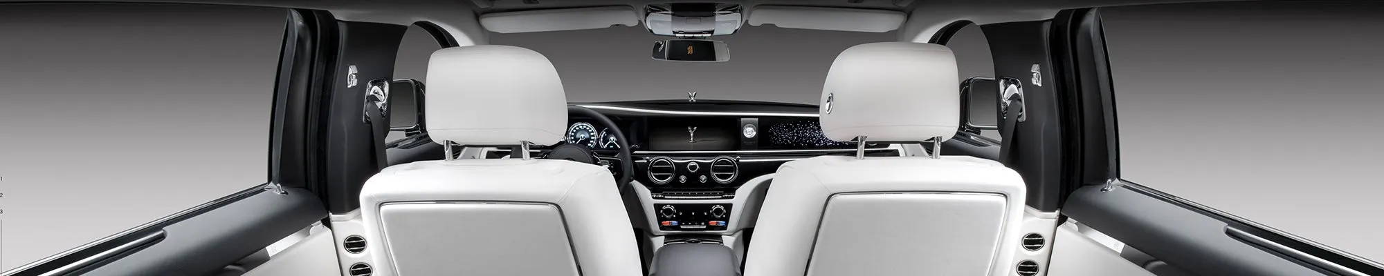 Rolls-Royce Ghost dashboard and technology display, showing the large infotainment screen and premium controls.
