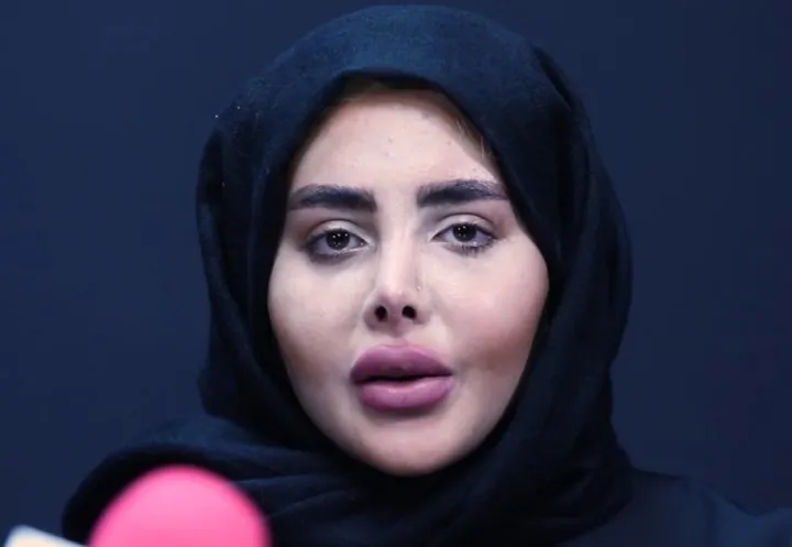 Sahar Tobar being interviewed on a local TV program. Photo: Rokna.net.