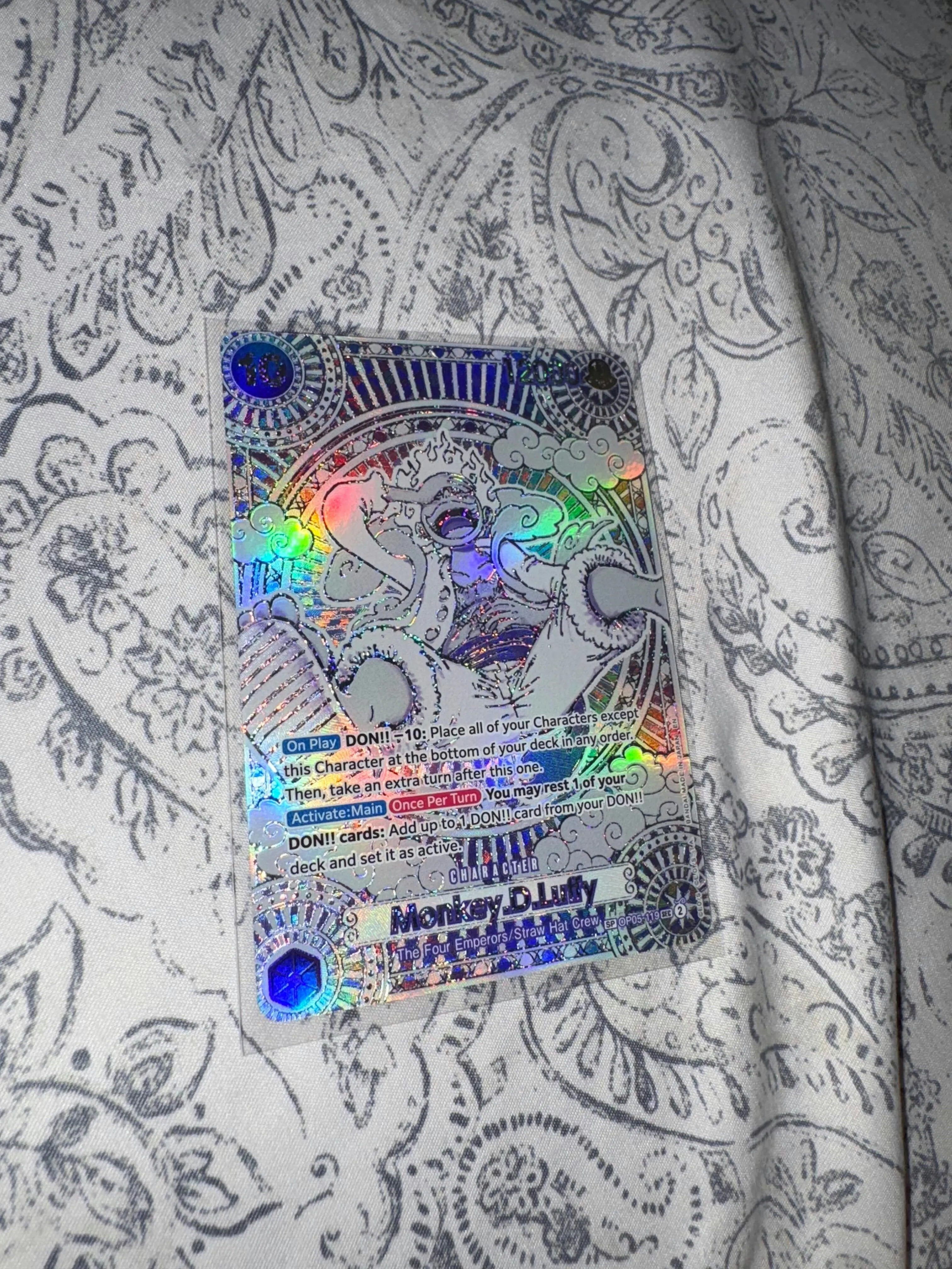 SC revealing silver Luffy SP pull from One Piece OP-11 Booster Box