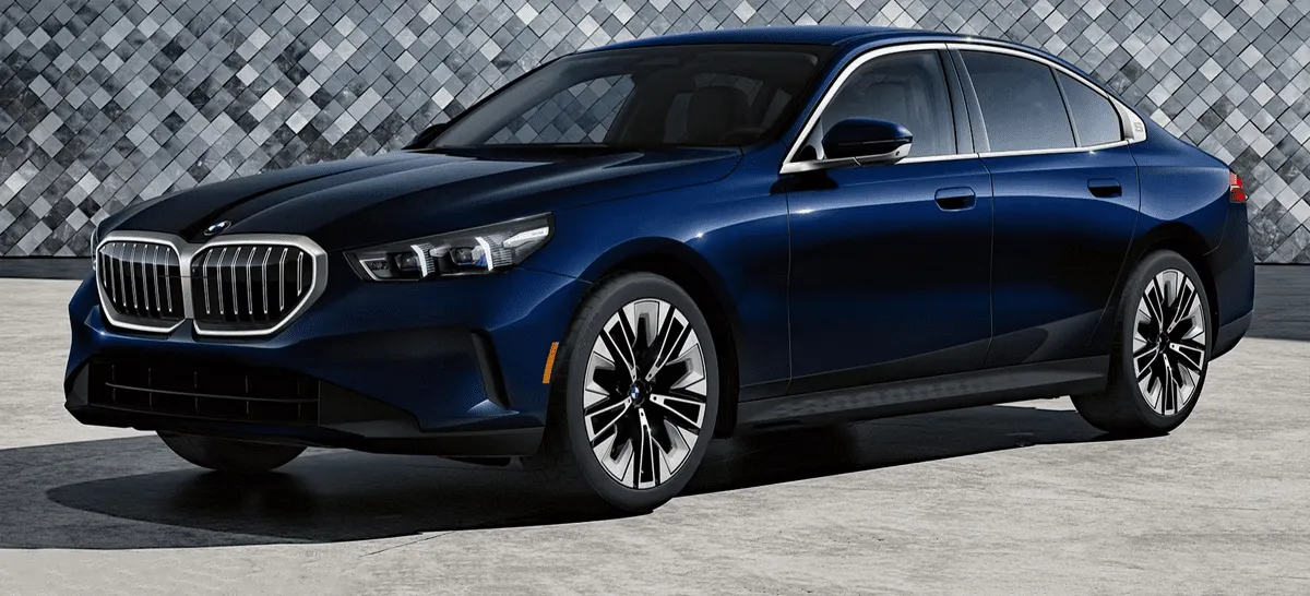 Sleek side profile of the 2024 BMW 5-Series sedan, showcasing its sophisticated lines and wheels.