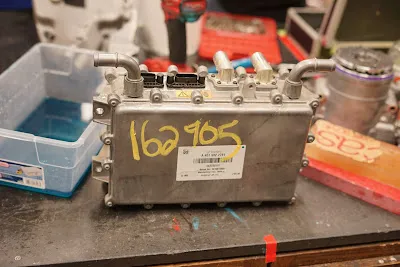 Smart Electric Drive unit with the charger removed, revealing a self-contained system.