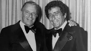 Stage scene with Sinatra and Bennett's introduction