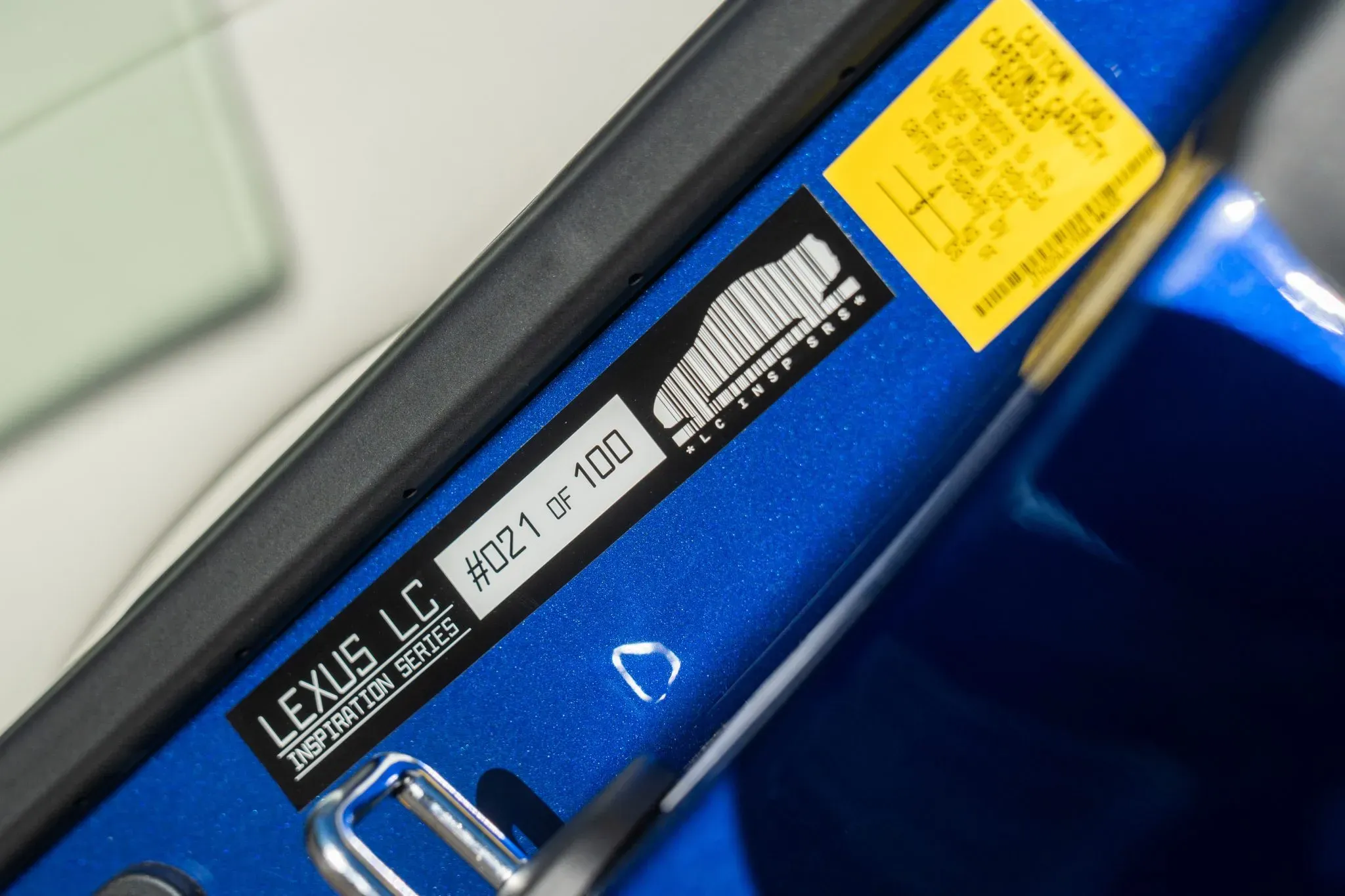 Steering wheel and digital gauges showing 10k miles in 2021 Lexus LC500