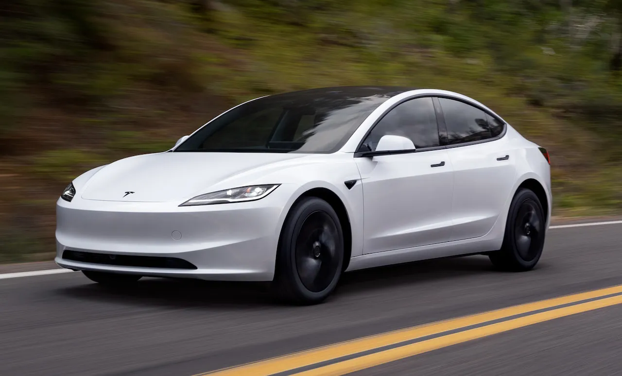 Tesla Model 3 Standard front three quarter angle moving