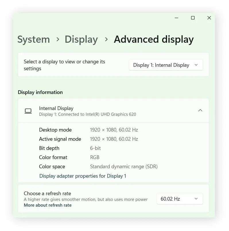 The Advanced display settings window displaying the installed graphics card, refresh rate, and desktop resolution.