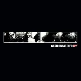 The album cover for Johnny Cash's Unearthed, featuring a stark black and white portrait of Cash.