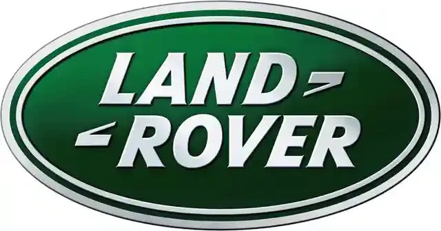The bold green oval with silver lettering of the Land Rover logo