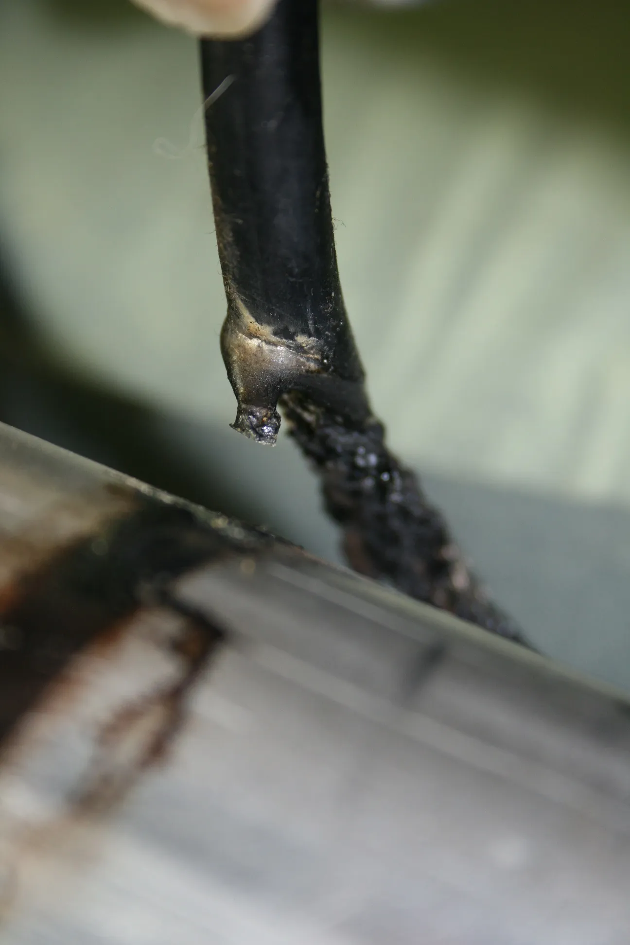 The H-pipe scraping paint off the driveshaft