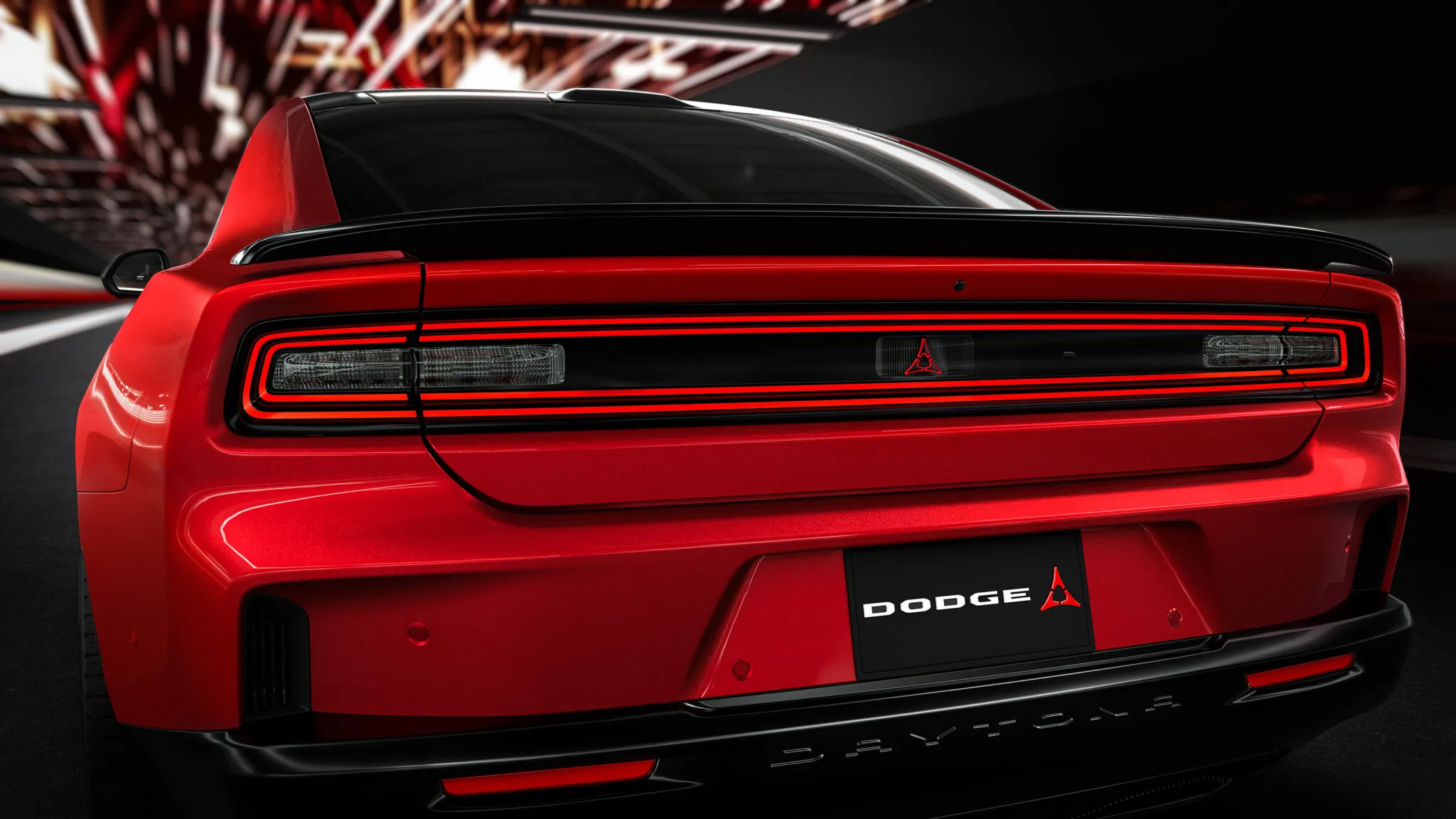 The imposing 410mm brake calipers and large wheels of the Dodge Charger Daytona Scat Pack, designed for superior stopping power on the track.