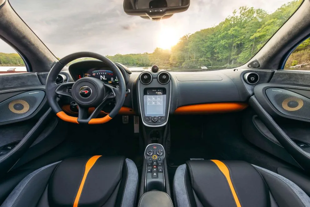 The interior of a McLaren 570S Spider shows its luxurious and meticulously crafted design.