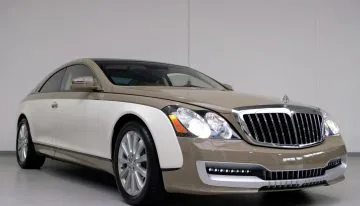 The luxurious interior of the Maybach 57S Xenatec Coupe, featuring a tri-color leather scheme and premium finishes.