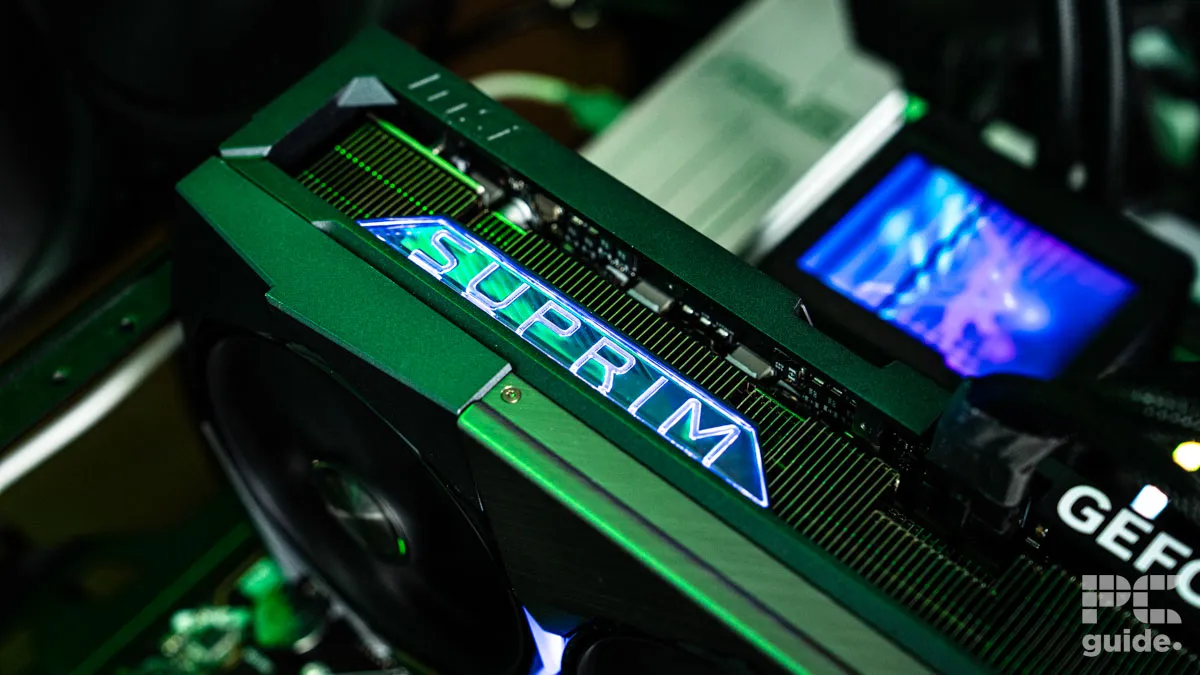 The MSI Suprim SOC RTX 5090 installed on a motherboard. It