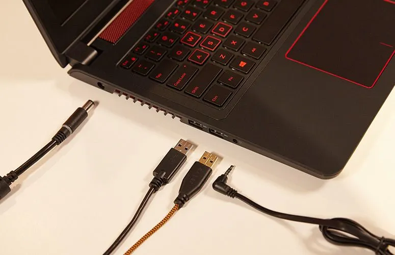 The open Dell Inspiron 15 5000 gaming laptop showing its screen, keyboard, and touchpad.