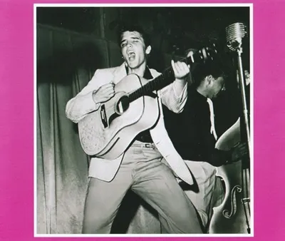 The perfect Elvis photo for under the CD holder.