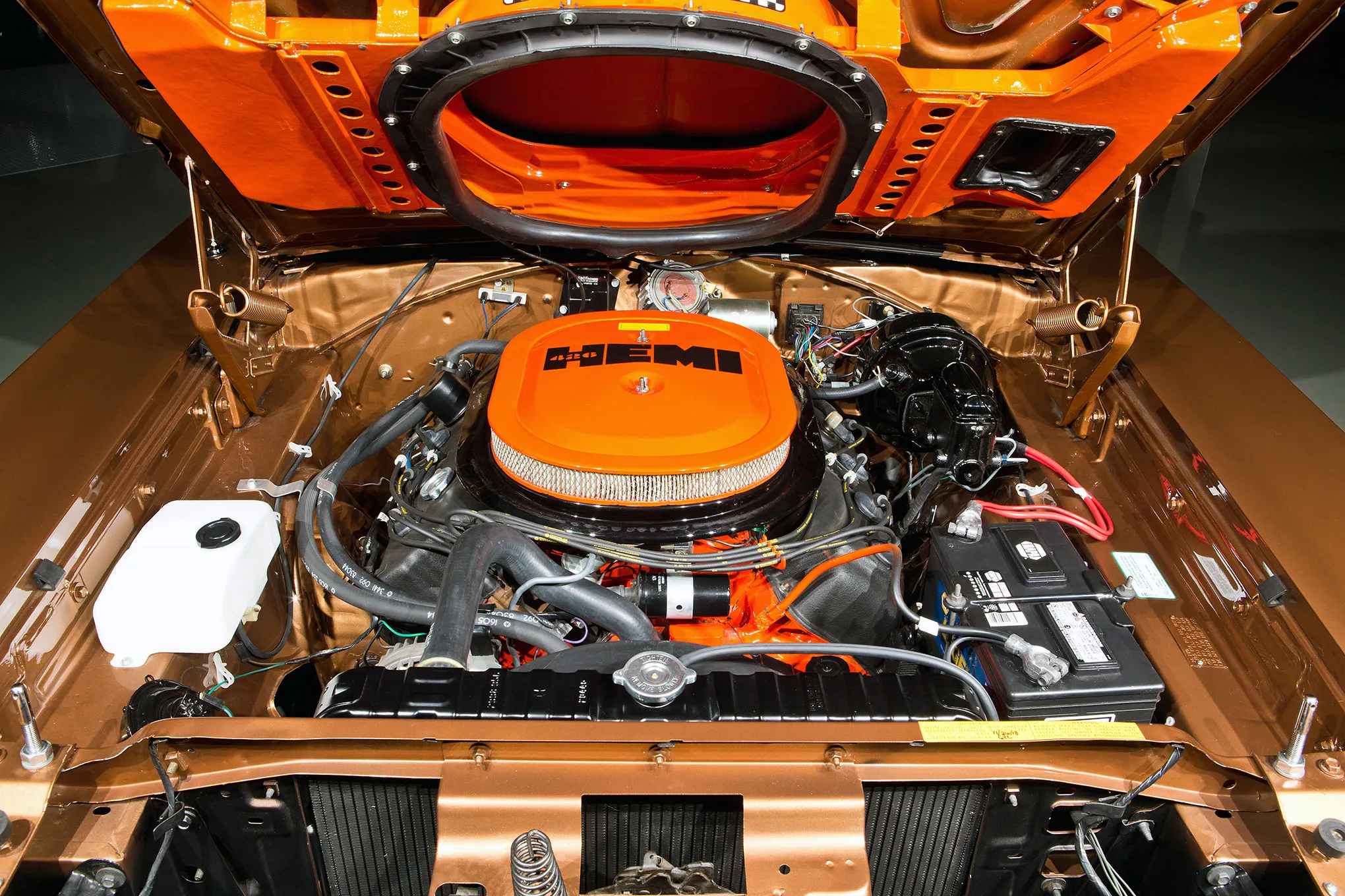 The powerful 426 cubic-inch Hemi engine bay of the 1970 Dodge Coronet R/T, showcasing its meticulous restoration and pristine components.