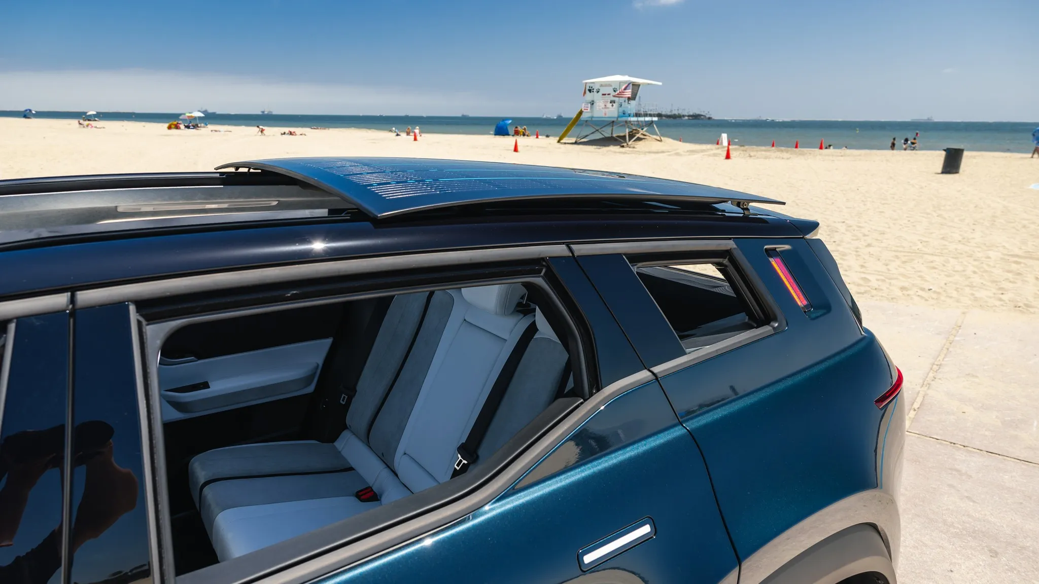 The side profile of the Fisker Ocean, highlighting its design lines and potential for safety features.
