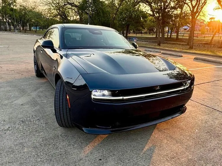 The sleek front profile of the 2024 Dodge Charger Daytona R/T Plus in After Dark color