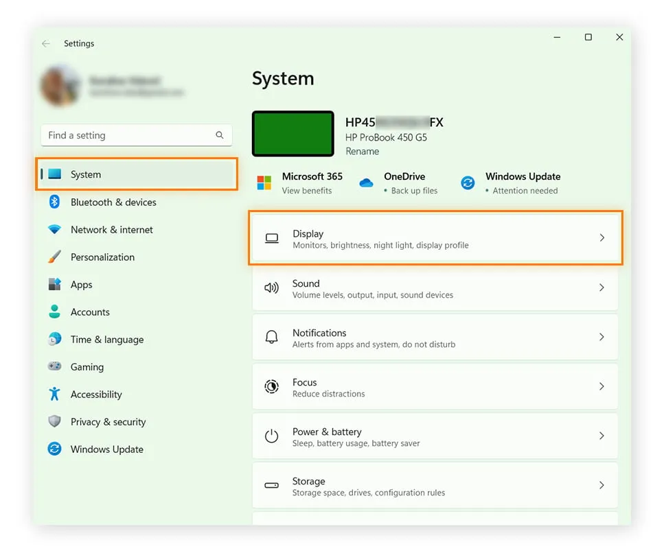 The Windows Settings window with "System" and "Display" selected.