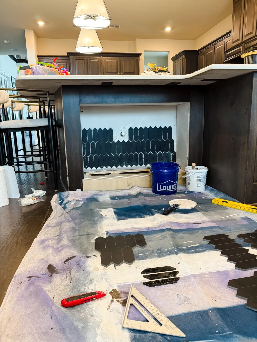 Tiling process over drywall base