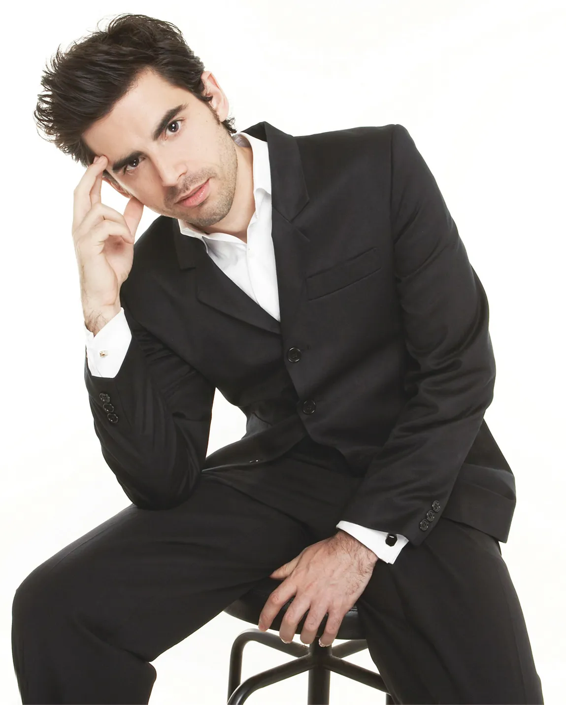 Tony DeSare, a versatile vocalist and pianist, is captured here in a dynamic performance.