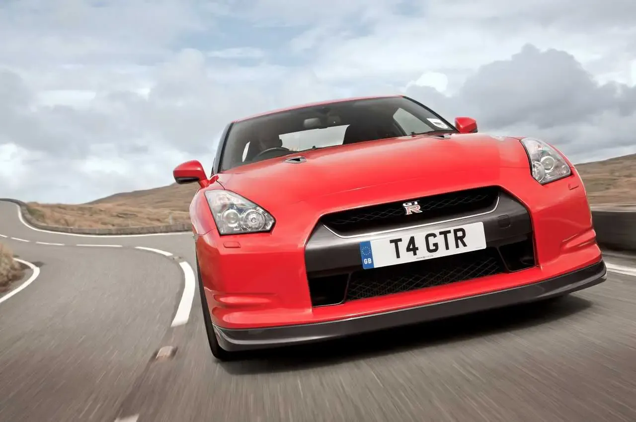 Used Nissan GT-R R35 supercar in silver on a road
