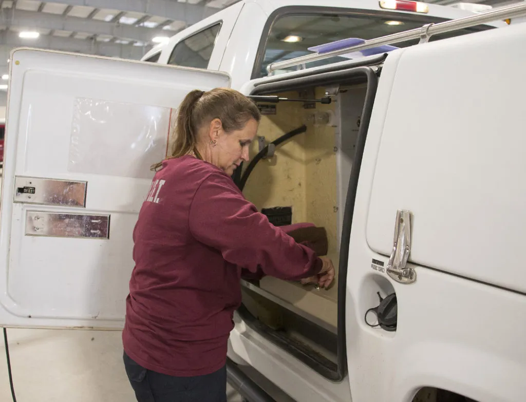 vet team member with support van