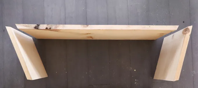 Wood pieces for the dog bowl stand arranged to show the leg angles